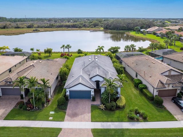 birds eye view of property featuring a water view