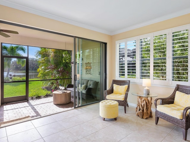 sunroom / solarium with ceiling fan