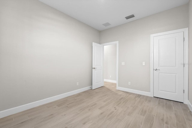 unfurnished bedroom featuring light hardwood / wood-style floors