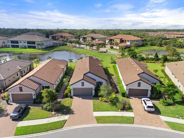 drone / aerial view with a water view