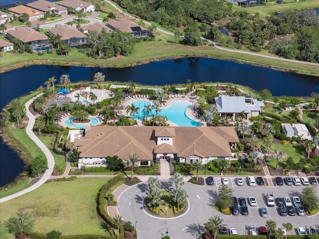 drone / aerial view with a water view