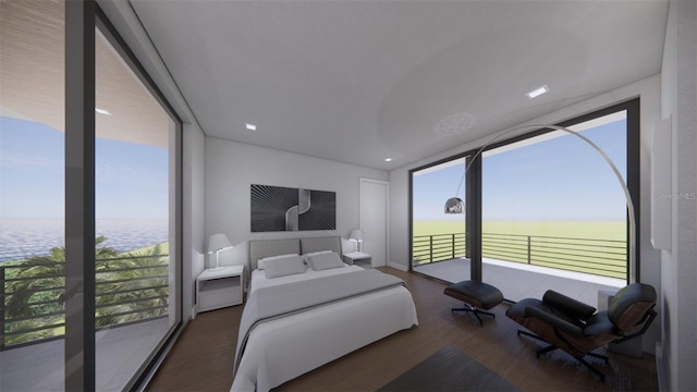 bedroom with a water view, multiple windows, and dark hardwood / wood-style floors