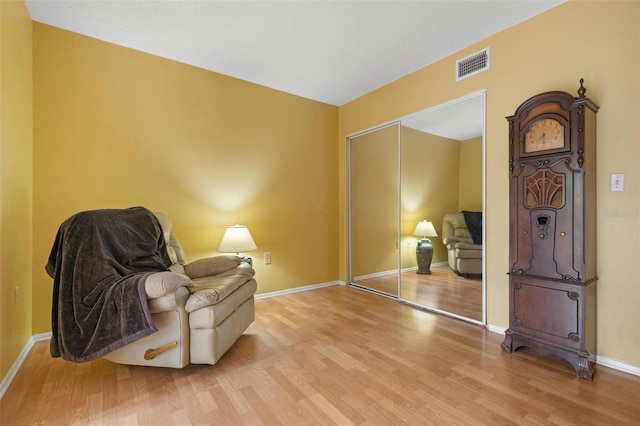 living area featuring light hardwood / wood-style floors