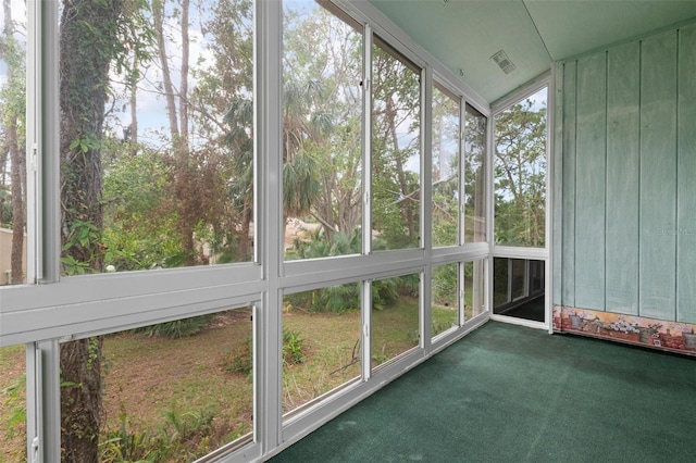 unfurnished sunroom featuring plenty of natural light