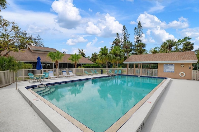 view of swimming pool featuring a patio