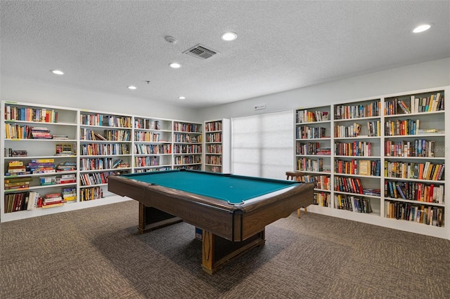 rec room featuring carpet floors, a textured ceiling, and pool table