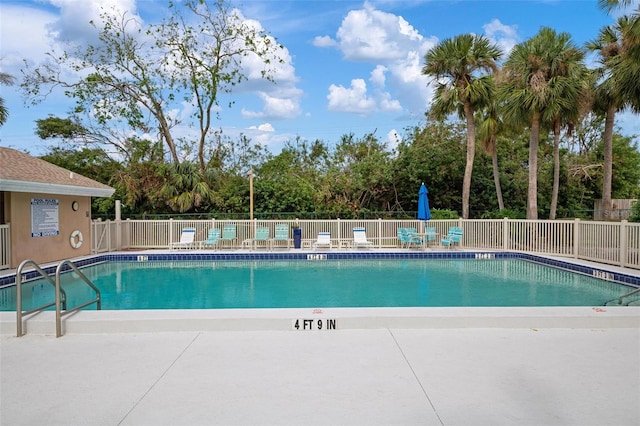 view of pool featuring a patio