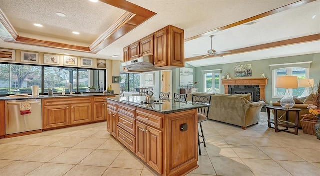 kitchen with dishwasher, a kitchen island, a raised ceiling, a kitchen bar, and black electric cooktop