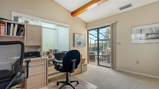 carpeted home office with vaulted ceiling with beams