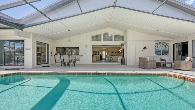 view of swimming pool with a patio area and an outdoor living space