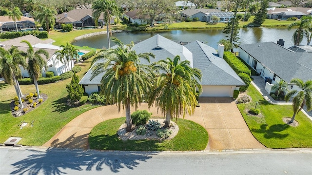 bird's eye view with a water view