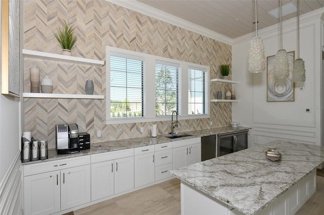 kitchen featuring beverage cooler, hanging light fixtures, light stone countertops, and white cabinets