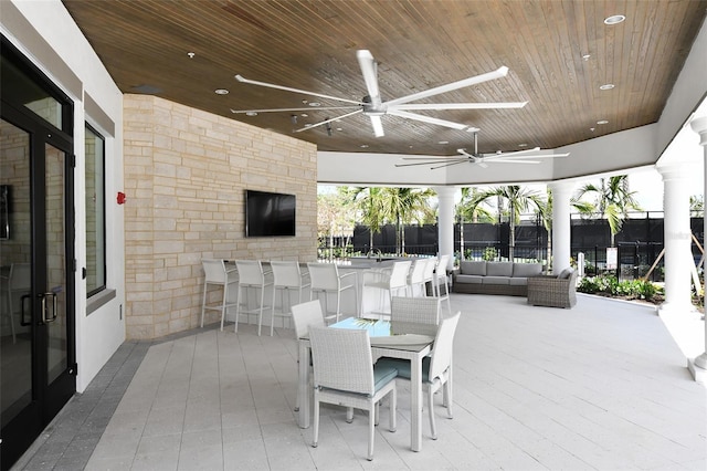 view of patio / terrace featuring ceiling fan