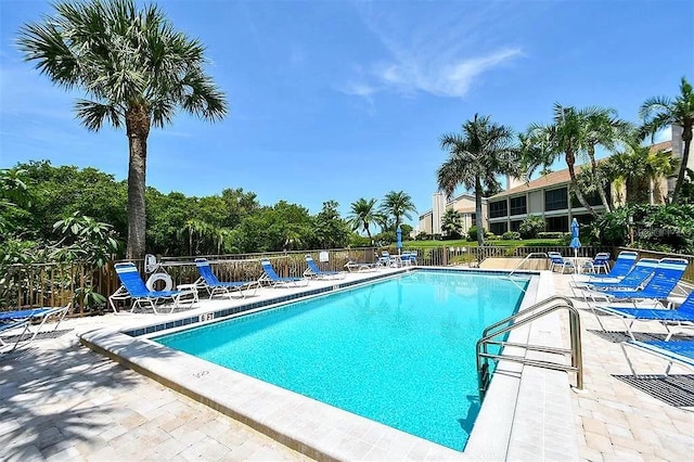 view of pool featuring a patio area