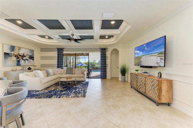 tiled living room featuring ceiling fan, beam ceiling, ornamental molding, and coffered ceiling