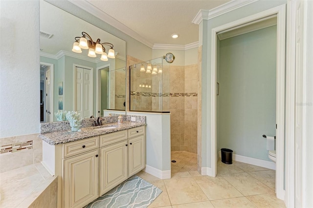 bathroom with vanity, crown molding, tile patterned flooring, toilet, and tiled shower