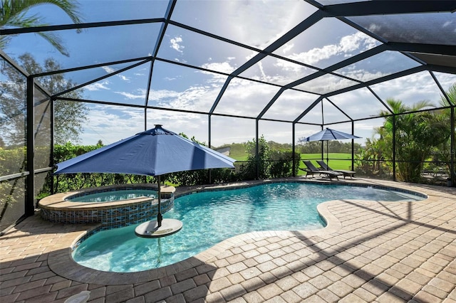 view of pool featuring glass enclosure, an in ground hot tub, and a patio