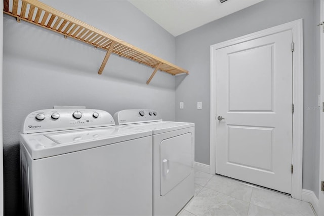 laundry area featuring independent washer and dryer