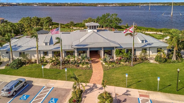 exterior space with a water view