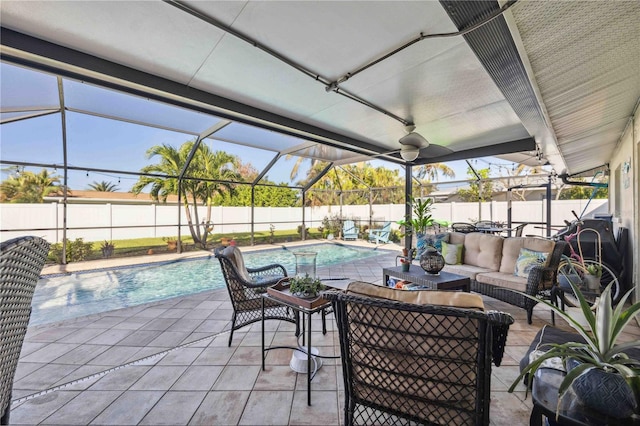 view of patio with a fenced in pool, outdoor lounge area, and a lanai