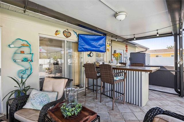 view of patio / terrace with an outdoor bar