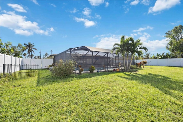 view of yard featuring a lanai