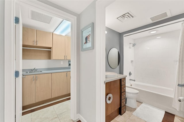 full bathroom with shower / tub combo, tile patterned floors, vanity, and toilet