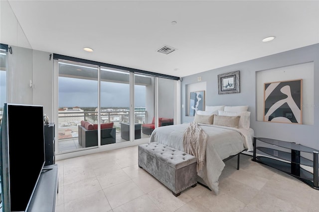 bedroom with access to outside and floor to ceiling windows