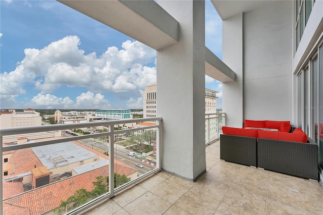 1990 Main St Unit 15, Sarasota, FL 34236 - balcony featuring a city view and an outdoor hangout area
