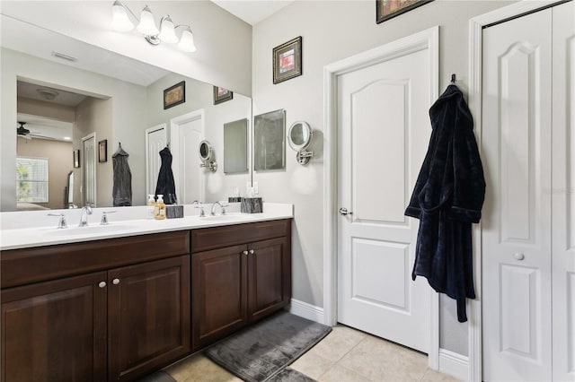 bathroom featuring ceiling fan, tile patterned flooring, and vanity