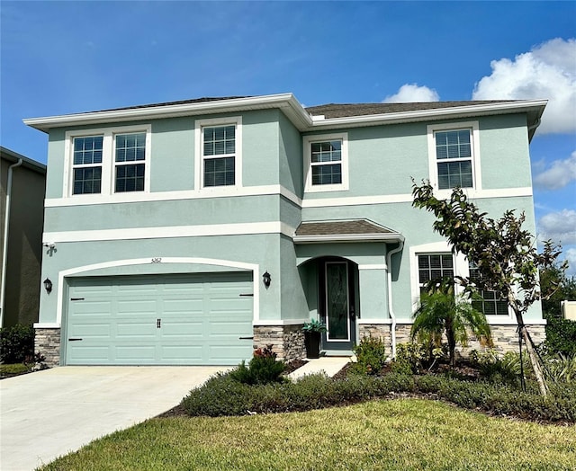 front of property with a garage