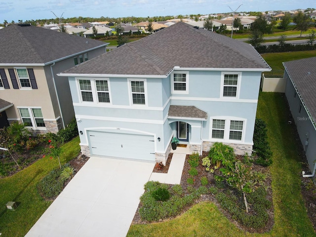 view of front of home with a garage