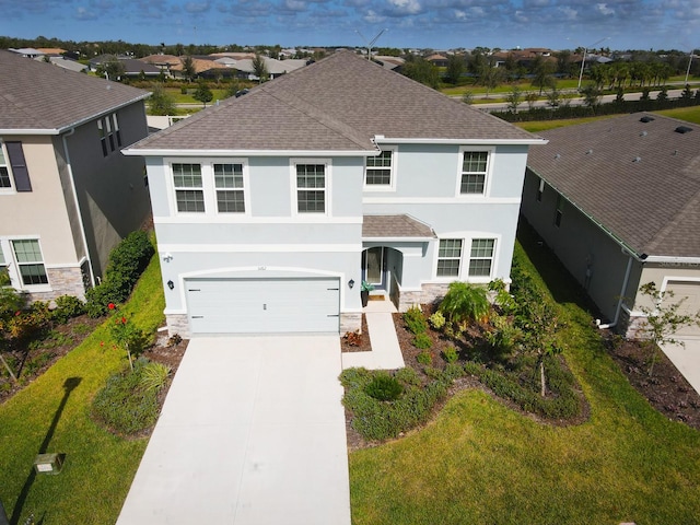 view of front of home with a garage