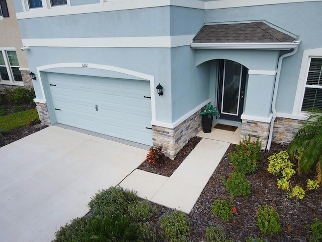 entrance to property with a garage