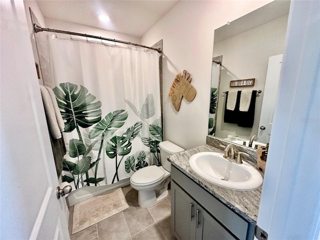 bathroom featuring tile patterned flooring, vanity, toilet, and a shower with curtain