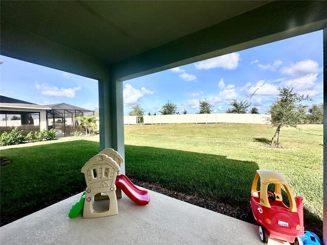 view of yard featuring a lanai