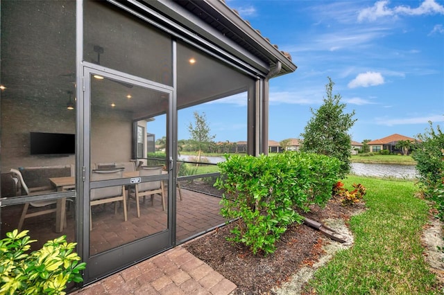 view of patio / terrace with a water view