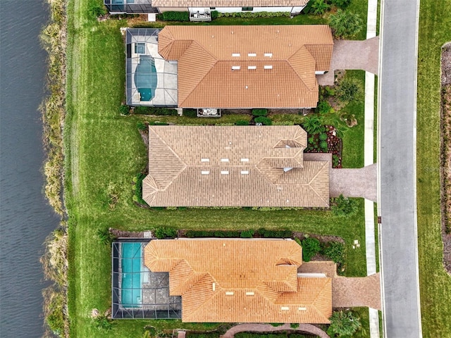 drone / aerial view featuring a water view