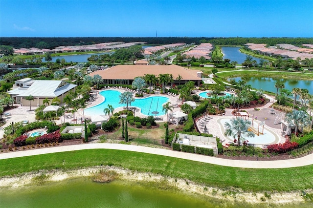 bird's eye view with a water view