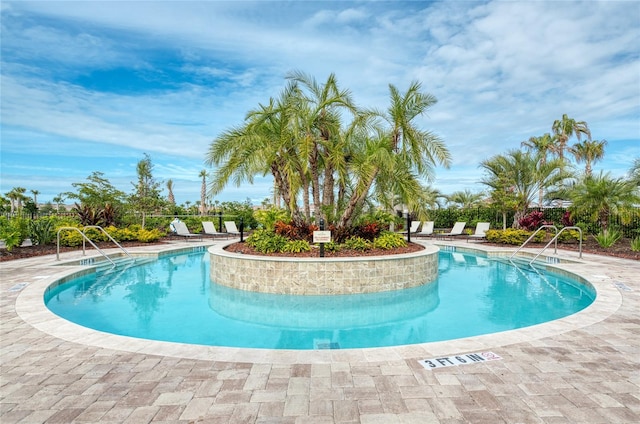 view of pool featuring a patio