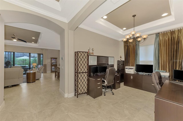 office space featuring ceiling fan with notable chandelier, a raised ceiling, and crown molding