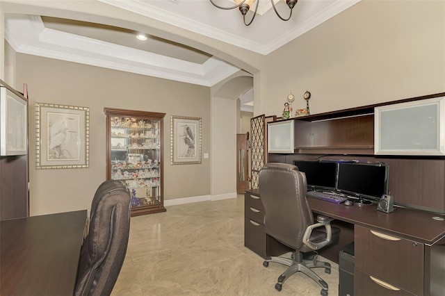 home office with a chandelier, crown molding, and a tray ceiling