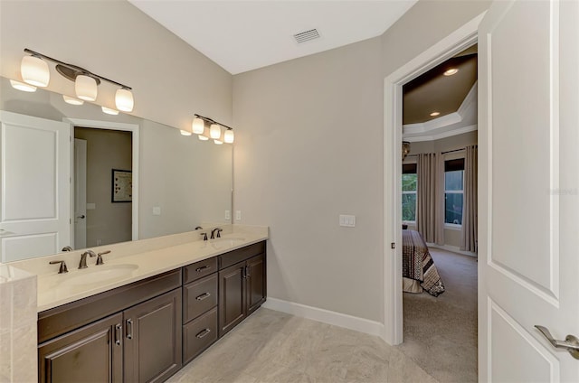 bathroom with vanity and crown molding