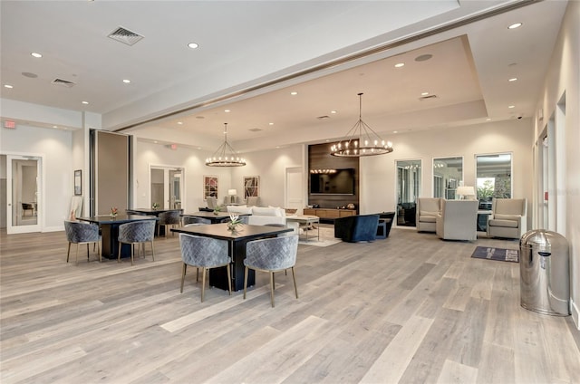 dining space with light wood-type flooring