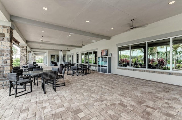 view of patio featuring ceiling fan