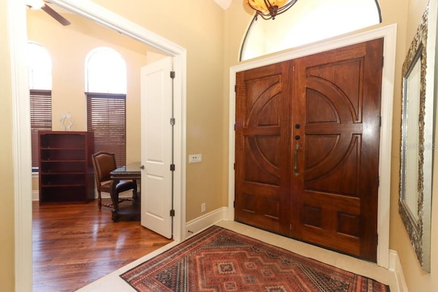 entryway featuring dark wood-type flooring