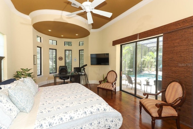 bedroom with ornamental molding, ceiling fan, dark hardwood / wood-style floors, a towering ceiling, and access to outside