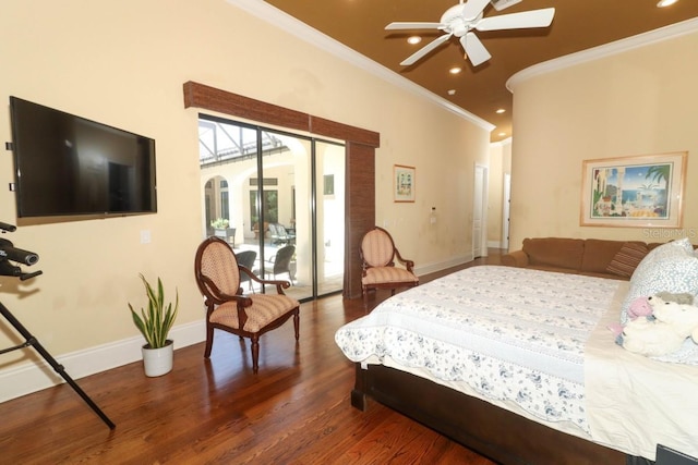 bedroom featuring hardwood / wood-style floors, ceiling fan, and crown molding