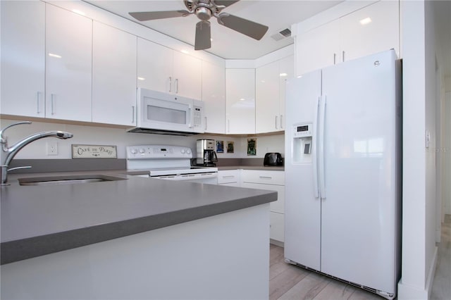 kitchen with white cabinetry, sink, ceiling fan, light hardwood / wood-style flooring, and white appliances