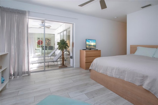 bedroom featuring light hardwood / wood-style floors and ceiling fan